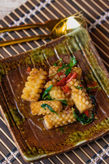 Stir-fried squid with spicy basil. Popular Thai food.
