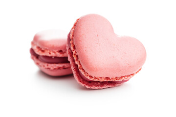 Heart shaped Sweet macarons isolated on white background.