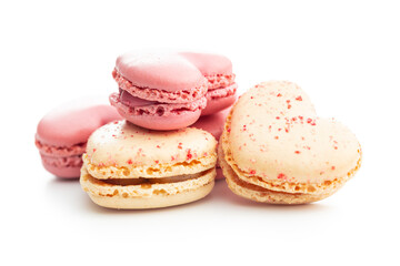 Heart shaped Sweet macarons isolated on white background.