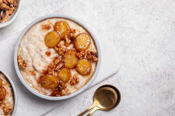 Porridge with caramelised banana and walnut for healthy breakfast