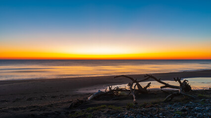 Fototapeta na wymiar Colorful seashore at dawn time