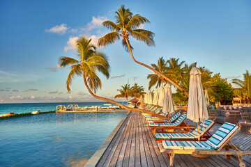 Maldives paradise scenery. Tropical aerial landscape, seascape with long jetty, water villas with...