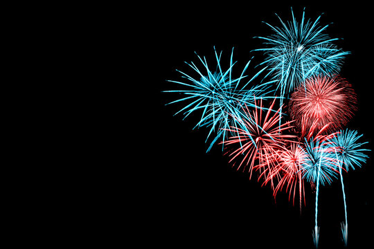Red and Blue Firework in black background
