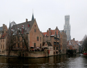 Fototapeta premium old houses and the Belfort tower in Bruges, Belgium