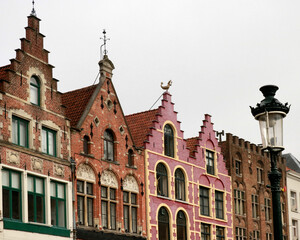 ancient houses with gabled facades in the medieval part of the town Bruges, Belgium