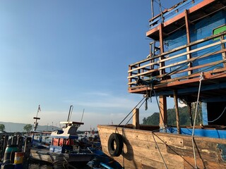 Fototapeta na wymiar Traditional wooden boats on the pier