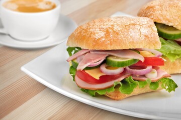 Tasty sandwich with cheese, mayonnaise and cherry tomatoes. Mediterranean appetizer. Breakfast concept.