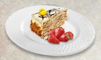 Tasty sweet dessert with strawberry and cream on the desk