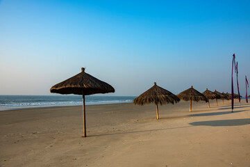 Recreational sunshade grass umbrella on the beach