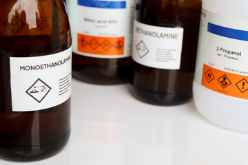 monoethanolamine in bottle, chemical in the laboratory