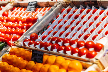 Fresh organic tomatoes on the street stall market