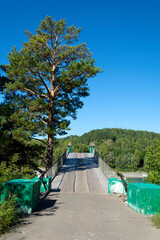 Entrance to the old suspension bridge over the Katun River near the village of Aya