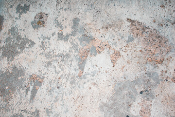 Fondo de piso de piedra con textura vieja y desgastada en cemento color gris 