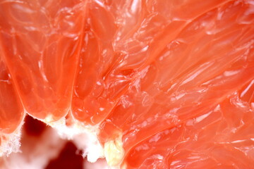 Top view of grapefruit slice, as background. Macro of red grapefruit. fruit citrus grapefruit texture background