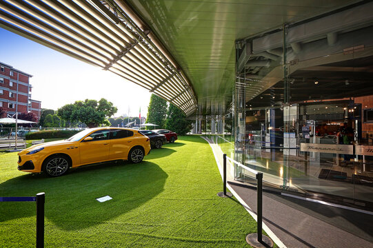 Modena, Italy, may 2022, Maserati cars in front of the official Maserati show room, Motor Valley exibition