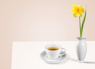 Flowers and tea cup served for breakfast, valentine's day, wedding or anniversary morning decorations.