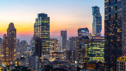 Fototapeta na wymiar Night of the Metropolitan Bangkok City downtown cityscape urban skyline tower Thailand - Cityscape Bangkok city Thailand