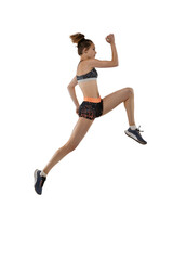 Fototapeta na wymiar Long jump technique. Studio shot of professional female athlete in sports uniform jumping isolated on white background. Concept of sport, action, motion, speed.