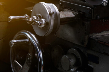 lathe control knobs close up. and turret, hand crank with scale. - obrazy, fototapety, plakaty