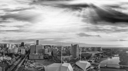 Stunning aerial panoramic view of Adelaide skyline at sunset in black and white, South Australia