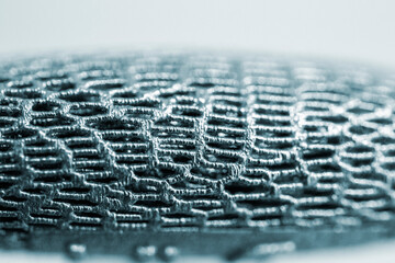Models printed on 3D printer for metal macro. Object surface close-up. Layout created on metal 3D...