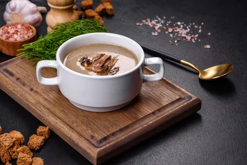 Fotobehang A delicious fresh, thick soup of mushroom puree with breadcrumbs, spices and herbs © chernikovatv