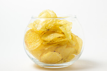 Potato chips on a white background. Delicious snack for beer and other drinks.