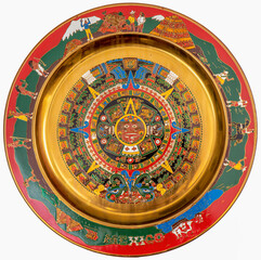 A replica of an Aztec calendar, on brass plate, from an original in Mexico.