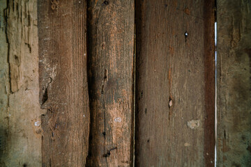 Old wood background panel in traditional Thai house