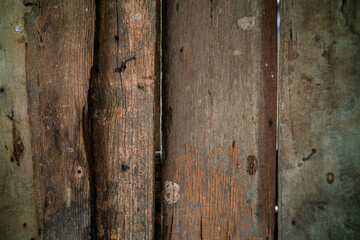 Old wood background panel in traditional Thai house