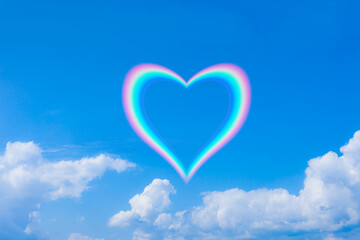 Obraz na płótnie Canvas 青空に虹のハート