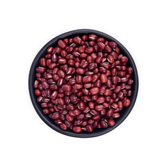 Red bean seeds in a black cup isolated on white background. Top view