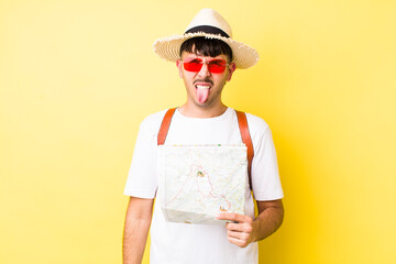 young hispanic tourist feeling disgusted and irritated and tongue out. holidays concept