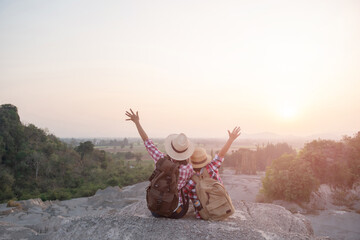 happy family enjoying vacations in autumn time. mother and daughter on picnic in mountains. mom and little child girl relaxing outdoors. adventure travel with kids, camping and hiking in nature.