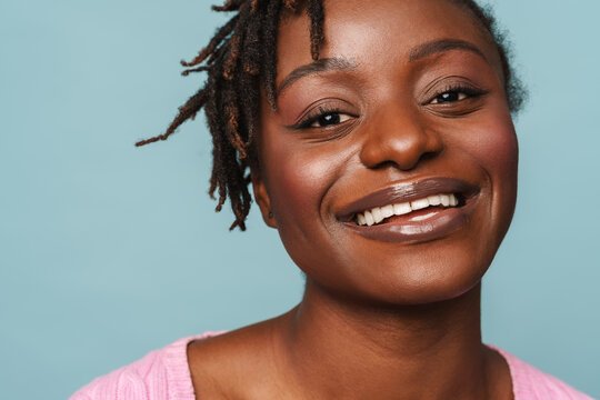 African american happy woman laughing and looking at camera