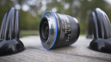 Close-up vintage professional camera lens. Action. Technical features of lens for professional...