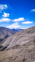 Fototapeta na wymiar Amazing valley with blue sky with clouds in India. Mountain valley. Travel in Himachal Pradesh. Nature
