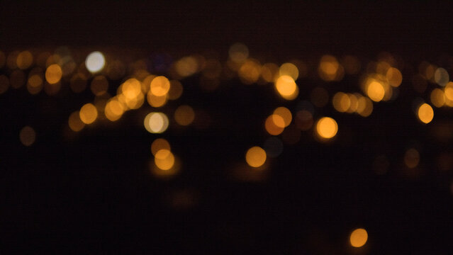 Abstract pattern of dark city light out of focus for background 