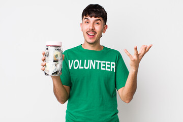 hispanic volunteer feeling happy, surprised realizing a solution or idea. donations concept