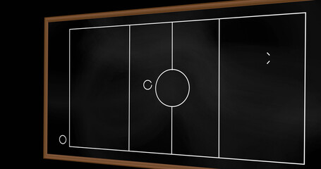 Image of football game plan on blackboard
