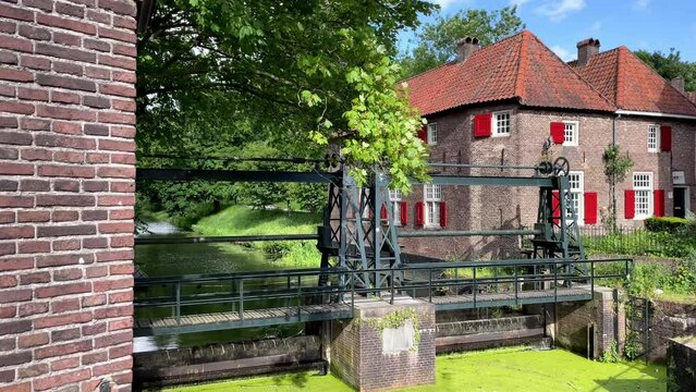 Amersfoort canal and pumping station near by the Koppelpoort. Slow motion shot