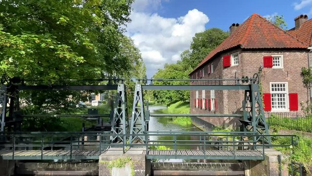 Amersfoort canal and pumping station near by the Koppelpoort. Slow motion shot and zooming in