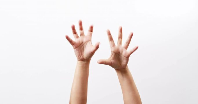 Close up of a woman's hand up and showing maul isolated on a white studio background with copy space for placing a text for an advertisement.
