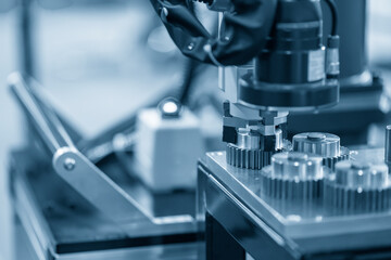 The hi-technology  material handling process by robotic system with metal gear parts.