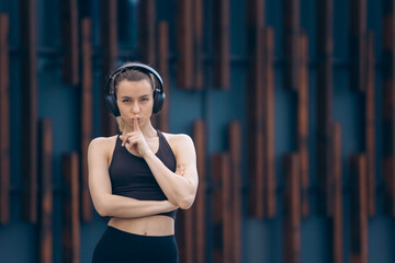 Blonde girl showing quiet.