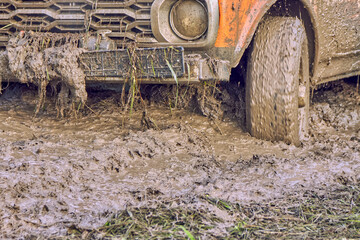 Offroader during an off-road race got stuck in a quagmire and fell through the mud. Got a full hood...