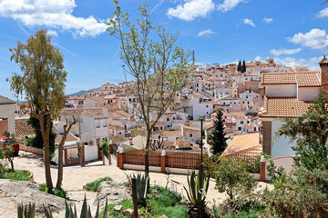 The Andalusian white village of Comares, on top of a hill in the mountains of the province of Malaga - obrazy, fototapety, plakaty