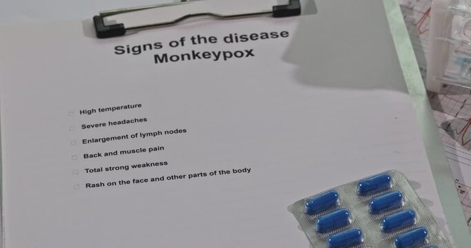 Medical table with infection blood sample test tube for Monkeypox virus phonendoscope, mask and gloves