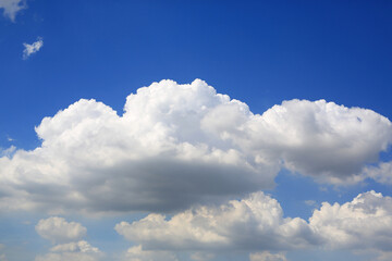 White fluffy cloud on blue sky background