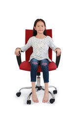 Asian little girl child looking at camera with sitting and relax on chair isolated on white studio...
